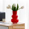 Vaso de vidro moderno minimalista feito sob medida em estilo vintage para arranjo de flores e hidroponia em casa, processado de acordo com o seu design, oferecendo um toque de luxo leve e de alta qualidade