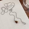 Collar de Ojo de Tigre y Gota de Agua Deslizante para Otoño e Invierno para Mujer, Nuevo Accesorio de Cadena Larga para Suéter de Diseño de Nicho de Lujo Ligero