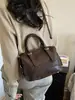 2026 Nuevo Bolso de Otoño para Mujer Retro Tejido de Hombro Único Cruzado Gran Capacidad para Viajar Bolso Almohada