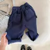 Otoño 2026 Huzhou Zhili Ropa Infantil Estilo Coreano Pantalones Cargo de Pana para Niñas y Niños 7539