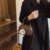 Bolso de Mano Tipo Concha Versátil de Moda de Este Año 2026 Nueva Moda de Primavera Nicho Estilo Coreano Color Sólido Bolso de Hombro Cruzado
