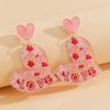 Comercio exterior nuevos aretes acrílicos de moda LOVE corazón de durazno personalidad femenina irregulares aretes LOVE ventas directas de fábrica