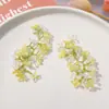 Chica de primavera Hyun-a borla color mágico flor de dos colores DIY tejido a mano tocado accesorios para el cabello pendientes material al por mayor
