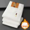 Jeans Blancos Italianos de Alta Gama a Prueba de Tres Elementos para Hombre, Corte Delgado, Elásticos, Pantalones Cónicos, Invierno 2026, Forrados de Polar y Engrosados