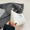 Elegante Bolso de Hombro con Decoración de Lazo Metálico - Bolso de Axila Negro Elegante de Piel Sintética para Ropa de Trabajo y Casual