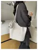 Bolso de hombro para mujer con alto atractivo estético, patrón tejido, nuevo bolso de moda para el día a día, bolso tote vintage relajado