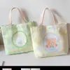 Linda bolsa de mano nueva, bolsa de lona versátil para oficinistas, bolsa estilo coreano para salidas, bolsa de estudiante, bolsa de bebé y bolsa para el almuerzo