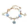 2025 Panjia Nuevo Más Vendido Colgante Flor Diamante Azul Mariposa Trébol de Cuatro Hojas Pulsera de Abalorios DIY Venta al por Mayor