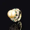 Anillo de Tesoro Verde Perla Blanca Dorada Obeida Incrustado Transfronterizo 2023 Anillo de Moda Retro Europeo y Americano para Mujer