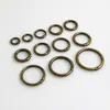Suministro de Guangzhou hebilla de conexión de anillo abierto de resorte de bronce anillo abierto accesorios de ferretería para equipaje hebilla de gancho bolsa