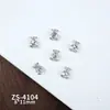 Accesorios de pedrería para decoración de uñas de aleación de plata brillante estilo lujo, diseño exquisito de nicho con decoraciones de uñas en forma de luna, lazo y corazón