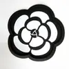 Agita la red de sonido Joyería para coche de网红 Coche diamante pluma almohadilla almohadilla de silicona para coche Perla flor de té almohadilla fabricantes una generación de pelo