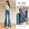 Jeans de mezclilla de tiro alto ligeramente acampanados para mujer con densos adornos de pedrería, nuevo modelo otoño 2026, pantalones elásticos de campana de caballo hasta el suelo
