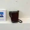 Bolso Cubo de Diseñador de Nicho Transfronterizo con Retazos de Gamuza para Mujer 2026 Otoño/Invierno Nuevo Elegante Versátil de Hombro Cruzado