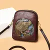 Bolso de hombro retro de estilo chino de moda para mujer, bolso de moda para madre de mediana edad con múltiples compartimentos, gran capacidad, bolso bandolera en relieve, moderno