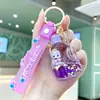 Chaveiro Estrela Preenchido com Óleo e Areia Movediça Desenho Animado, Chaveiro de Boneca Transparente em Acrílico com Areia Movediça, Decoração para Mochila de Estudante