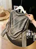 Camiseta de Rayas Melanoides para Mujer 2026 Otoño Temprano Nuevo Estilo Holgada Adelgazante Ropa Interior Superior de Capa Base Irregular