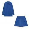Conjunto Nova Moda Europeia e Americana 2026 Casual com Blocos de Cor Camisa de Botão Único e Shorts Elástico Conjunto de Duas Peças
