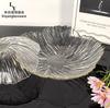 Plato Transparente de Flores Estilo Europeo para Sala de Estar Hogar Estilo Simple de Gama Alta Phnom Penh Vidrio de Cristal Plato de Frutas Plato de Frutas Secas Venta al por Mayor