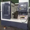 Tck56Y Torno CNC de Bancada Inclinada, Eixo com Passagem Central Servo Motorizado, Torreta Elétrica, Máquina-Ferramenta CNC Composta de Torneamento-Fresamento