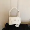 Bolsa de Braço Texturizada para Mulheres 2026 Novo Estilo Francês Moda de Nicho Bolsa de Ombro High-End Retro Elegante Bolsa de Mão