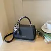 Bolso pequeño transfronterizo 2026 nuevo super popular para mujer, bolso de hombro de alta gama, bolso cruzado cuadrado pequeño