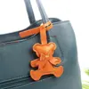 Nuevo Colgante de Oso con Lazo de Cuero de PU, Encanto de Bolsa de Dibujos Animados Multicolor, Accesorio para Llavero, Decoración de Regalo
