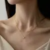 Colar Feminino Exquisito em Aço Titânio com Diamante Único Semi-Camadas Temperamento Luxo Leve Nicho Sentido de Alto Padrão Corrente de Clavícula em Pérolas Douradas Camadas Gargantilha
