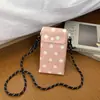 Bolsa de teléfono tejida color caqui de diseño nicho de verano para mujer, nuevo estilo 2026 bolso pequeño cuadrado de paja, bolso de hombro y cruzado