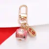 Estilo Chino Atrae Fortuna Cerámica Gato de la Suerte Llavero Colgante Estuche para Auriculares Bolso Encanto Accesorio Adornos Pequeños Venta al por Mayor