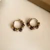 Pendientes de borla con carcasa de madera marrón transfronterizos europeos y americanos, pendientes de estilo vintage Maillard, pendientes de mujer de lujo ligero de alta gama