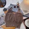 Colete Tricotado Curto sem Mangas com Decote V na Cintura para Mulheres 2025 Primavera e Verão Estilo Coreano Versátil Look Emagrecedor Regata Suspender