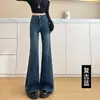 Foto real de jeans acampanados de alta resistencia con adornos de pedrería para mujer, nuevo modelo primavera/otoño 2026, de cintura alta, adelgazantes, que cubren la cadera, pantalones de campana súper elegantes