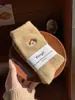 Calcetines de terciopelo australianos calcetines de tubo para mujer otoño e invierno con forro polar gruesos cálidos calcetines para bebé calcetines peludos para dormir al por mayor
