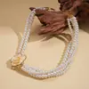 Collar de perlas en capas con cuentas transfronterizo europeo y americano, cadena para la clavícula estilo fiesta vintage, lujo ligero, accesorio versátil de alta gama para mujer