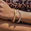 Pulsera Ovalada Fotosensible Metálica Transfronteriza Europea y Americana, Moderna y Elegante, Pulsera Única con un Toque de Lujo, Joyería de Nicho para Mujeres