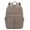 Mochila de viaje, para ir al trabajo y para la escuela de diseño minimalista, tela de nailon, impermeable, versátil, moderna, mochila para mujer de estilo simple
