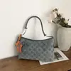 2026 Bolso Pequeño Nuevo para Mujer Diseño de Nicho Bolso Tote Moda Personalidad Tendencia Simple Elegante Bolso de Hombro Único Cruzado