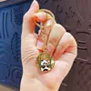 Llavero Colgante de Metal con Dibujo Animado Estilo Chino de Panda Decoración Linda para Bolso Llavero de Coche Pequeño Regalo