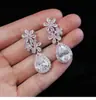 Pendientes de Zirconia de Lujo Súper Brillantes 2026 Tendencia de Moda Más Vendidos Pendientes de Botón Diseño de Nicho Personalidad Joyería para Orejas Venta al por Mayor