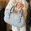 Bolsa Boston de Mão com Textura de Couro Elegante para Mulheres 2025 Novo Estilo Coreano Bolsa Transversal de Nicho Bolsa de Ombro para o Dia a Dia