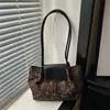 Bolso de mujer para ir al trabajo 2026 nueva moda de otoño simple de gamuza para hombro o axila bolso tipo cubo de gran capacidad para mujeres