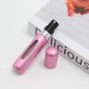 Botella pequeña de perfume de 8 ml con llenado inferior, portátil para viaje, auto-bomba, en stock, cabeza redonda, reciclaje, spray para viaje