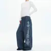 Calça de moletom da moda estilo americano, com estampa marmorizada, perna larga e cordão, para homens e mulheres, apresentando um design solto de perna reta, perfeita para outono e inverno
