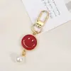Pingente de Celular de Corrente de Pérolas em Formato de Coração Fresco e Versátil, Pingente de Bolsa de Flor Bicolor, Pequeno Pingente de Chaveiro Versátil