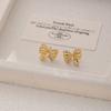 Pendientes de lazo de diamantes de moda transfronteriza europea y americana, pendientes de lazo de circonita de alta gama con sentido del nicho.