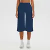 Pantalones capri de yoga de color liso, tela cepillada, estilo europeo y americano, transfronterizos, de cintura alta, control de abdomen, pierna ancha, casual para exteriores, atléticos y para fitness