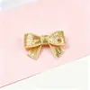 Venta al por mayor de fábrica Lentejuelas Multicolor Lazo Nudo Accesorios para el Cabello DIY Accesorios para Ropa Broche Joyería Accesorios Transfronterizo En Stock
