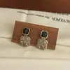 Pendientes de Aguja de Plata S925 Color Caramelo Maillard Retro Otoño e Invierno para Mujer Pendientes de Botón Geométricos Avanzados con Piedra de Ojo de Tigre Venta al por Mayor