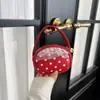 2026 Bolso de Mano Portátil con Lunares Elegantes Bolso Redondo Pequeño Personalizado Billetera para Monedas de Moda Diseño de Nicho en PU Bolso Sencillo tipo Sobre Rojo